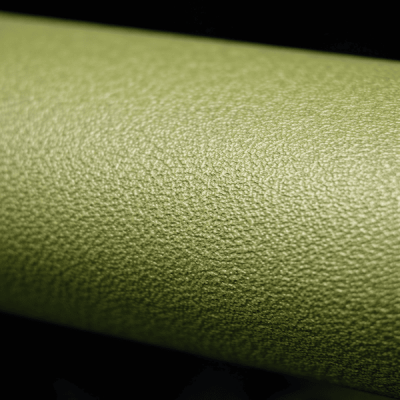 Zbliżenie teksturowanej powierzchni detalu z tworzywa sztucznego wykonanej metodą laserową