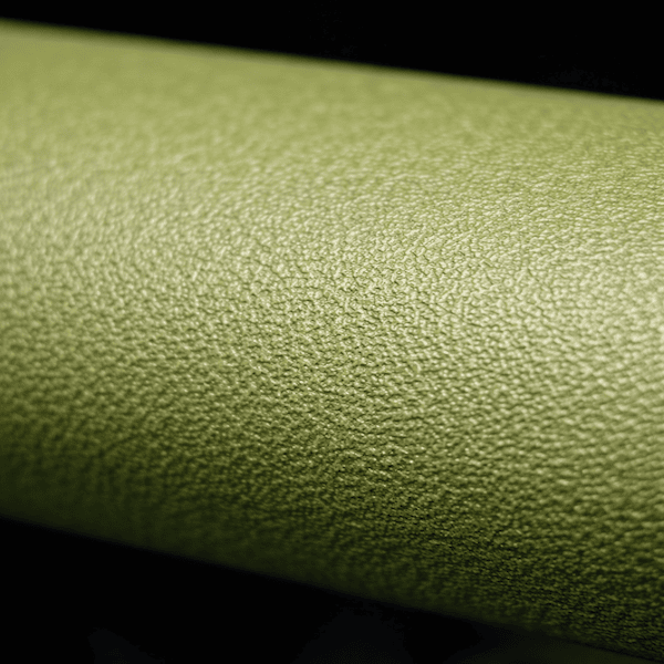 Zbliżenie teksturowanej powierzchni detalu z tworzywa sztucznego wykonanej metodą laserową